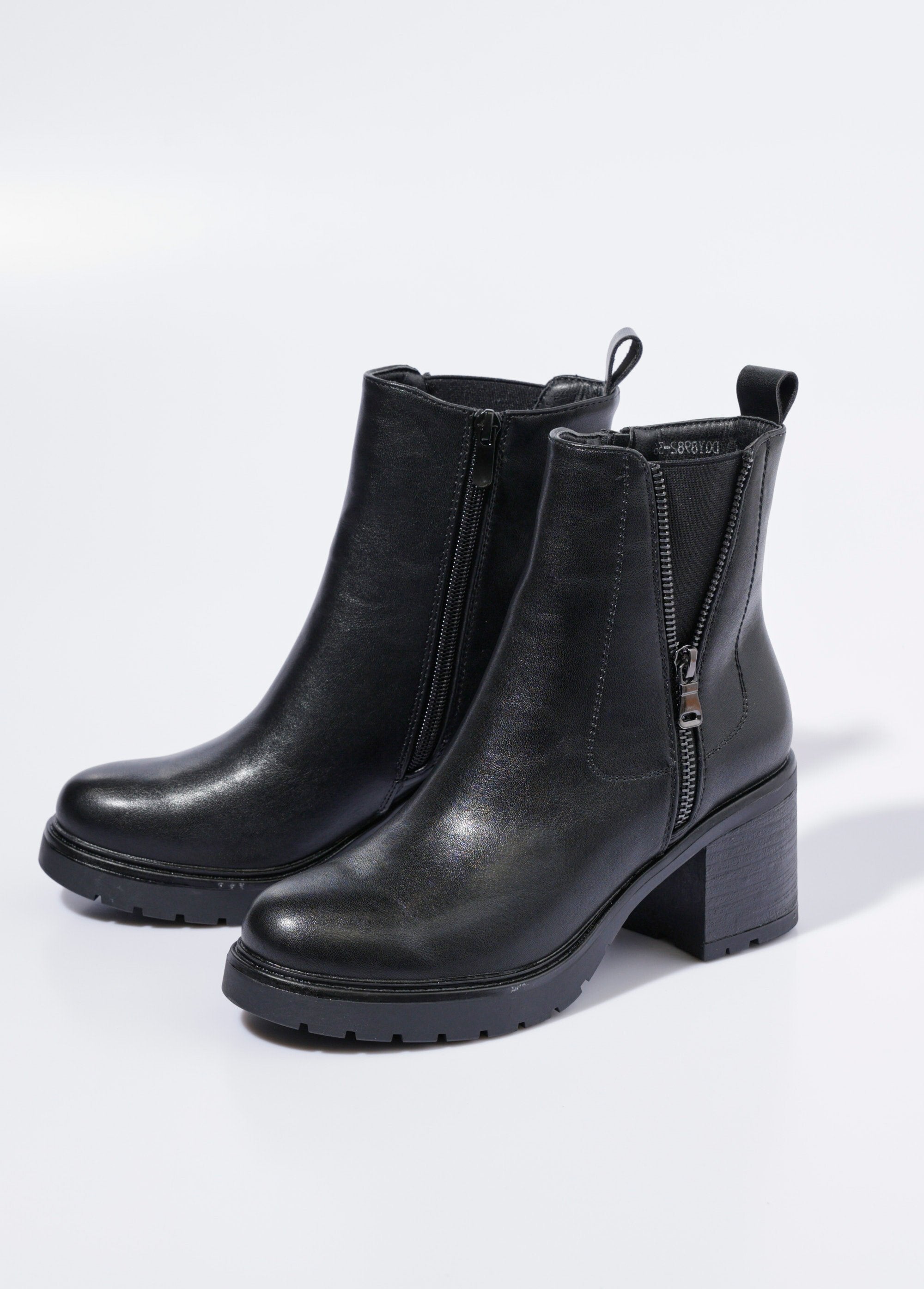 Heeled_boots_with_notched_sole_and_zips_Black_DE1_slim