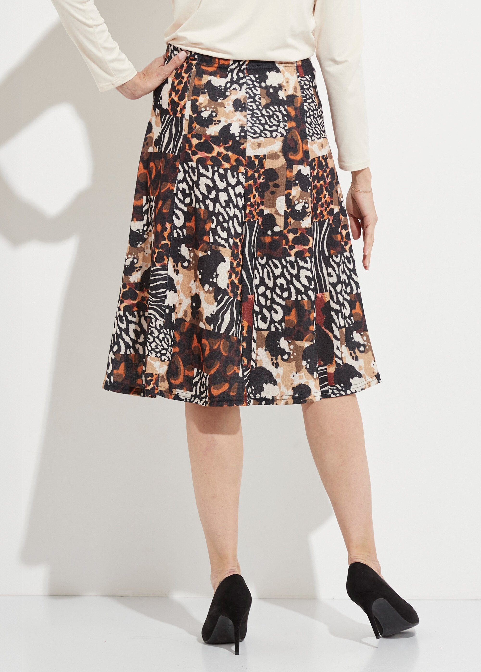 Mid-length_flared_skirt_with_animal_print_and_warm_knit_Black_and_orange_DO1_slim